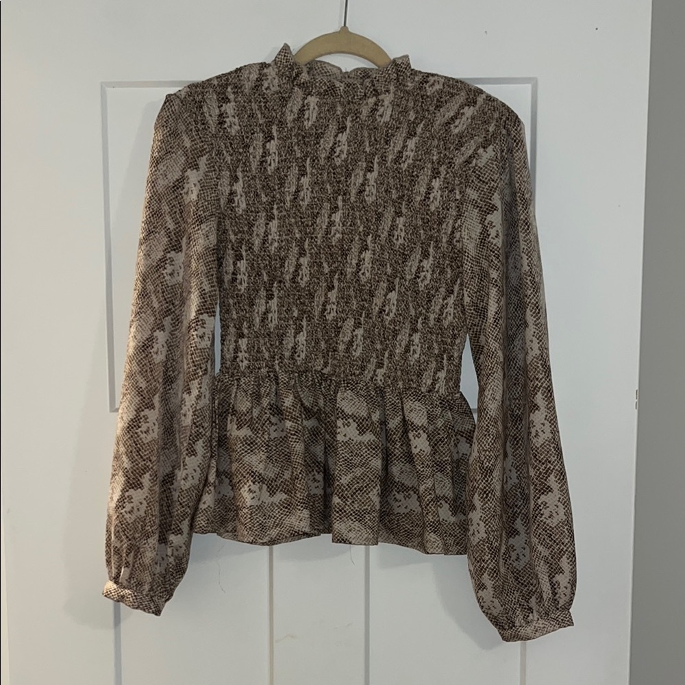 Vestique snake print top